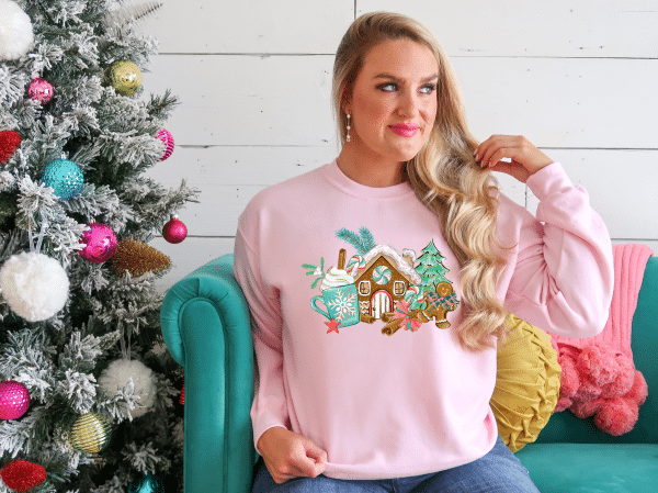 GINGERBREADHOUSEMANCOCOAPINKSWEATSHIRT